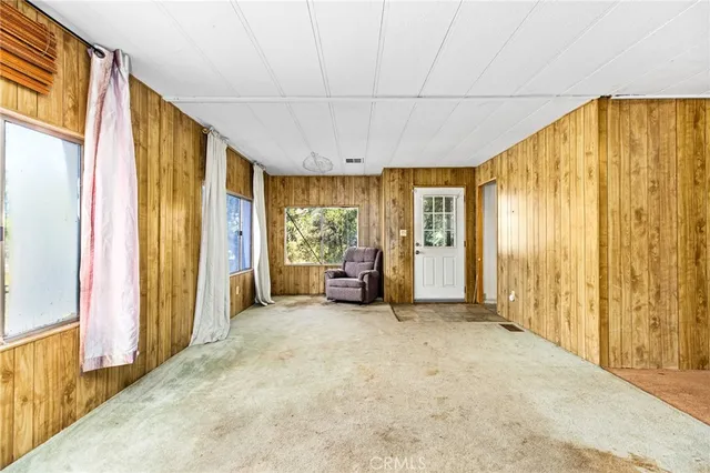 a view of a bathroom from a hallway