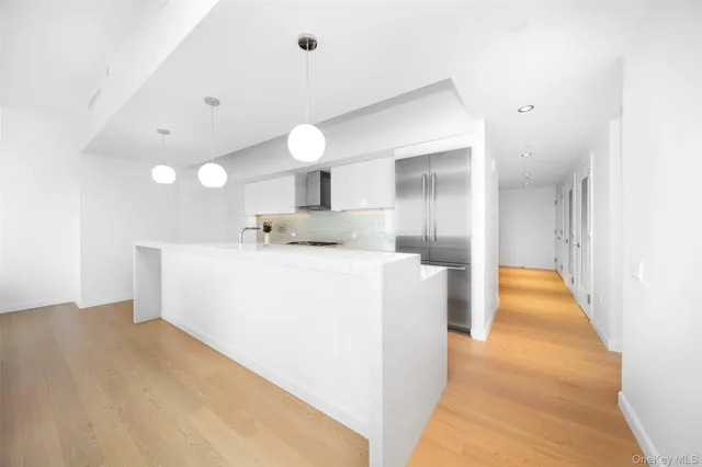 a bedroom with a bed and a cabinets