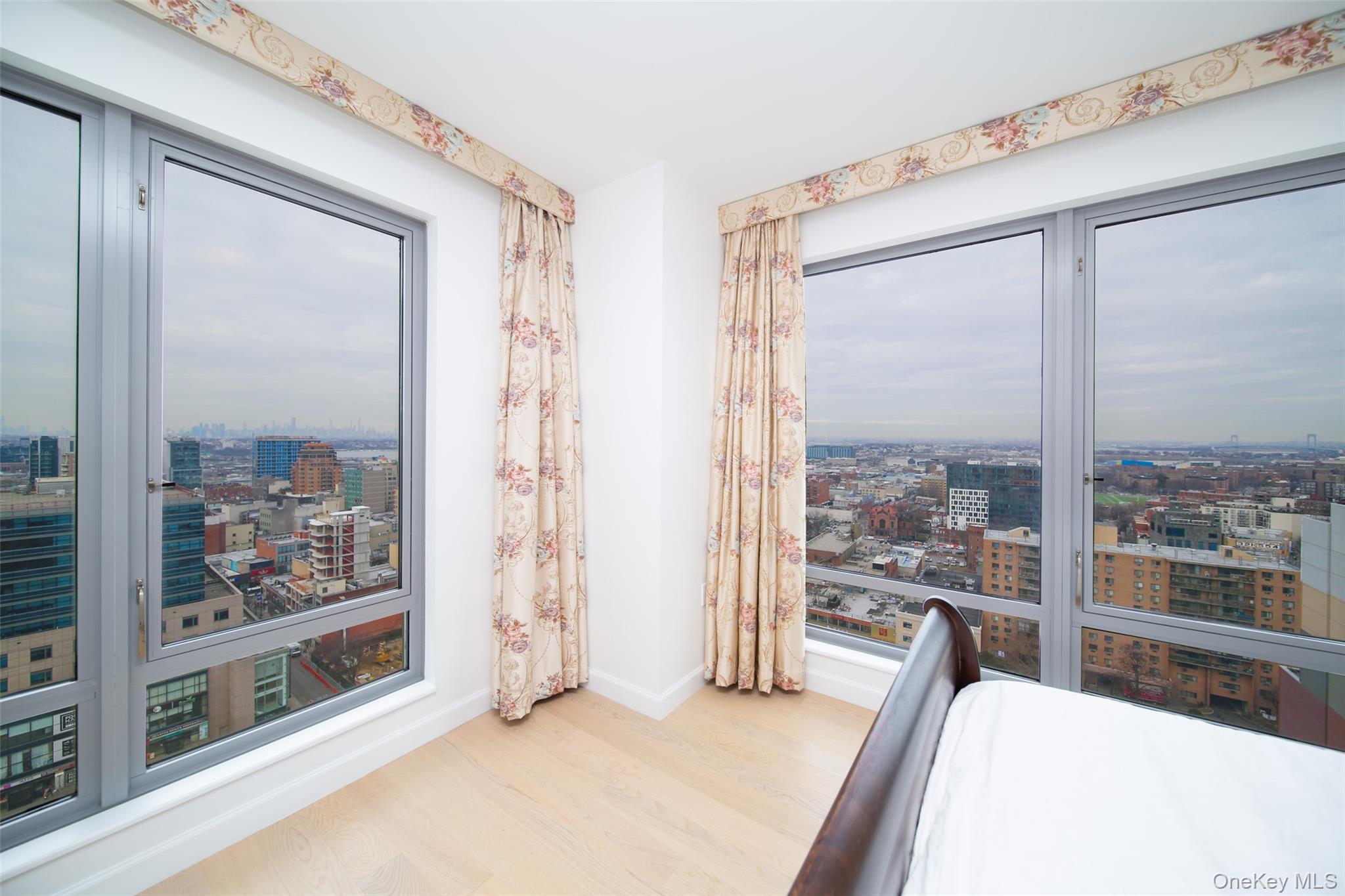 138-35 39th Avenue, Unit 17H Queens, NY 11354 - Photo 18 of 36 a living room with furniture