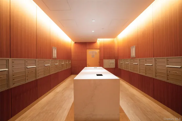 a view of a bathroom with a sink and mirror