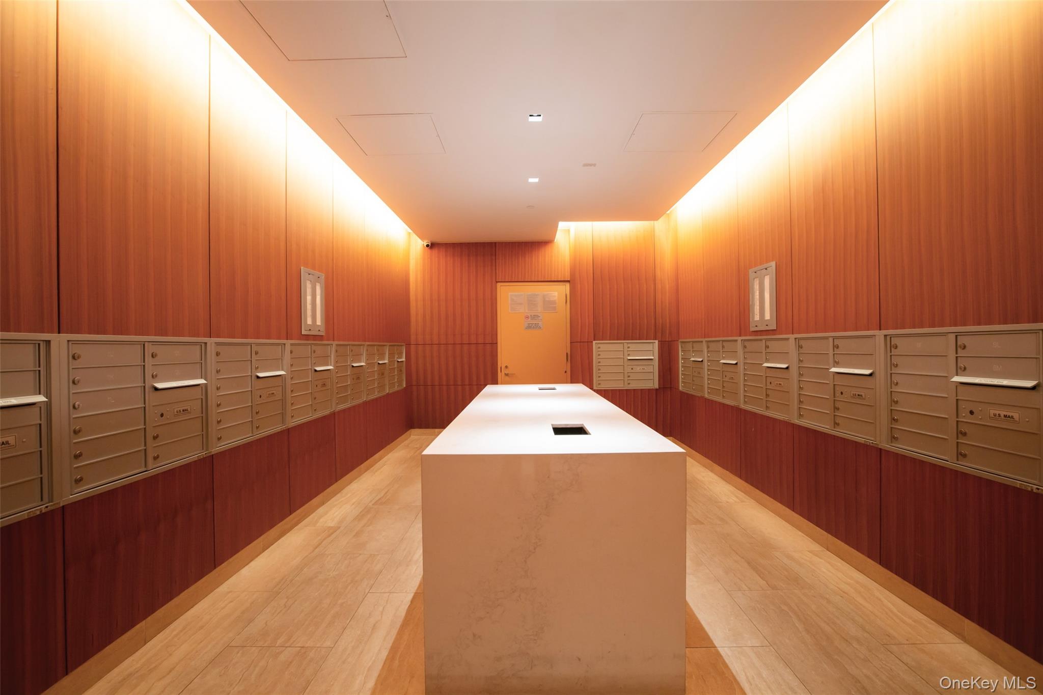 138-35 39th Avenue, Unit 17H Queens, NY 11354 - Photo 4 of 36 a view of a bathroom with a sink and mirror