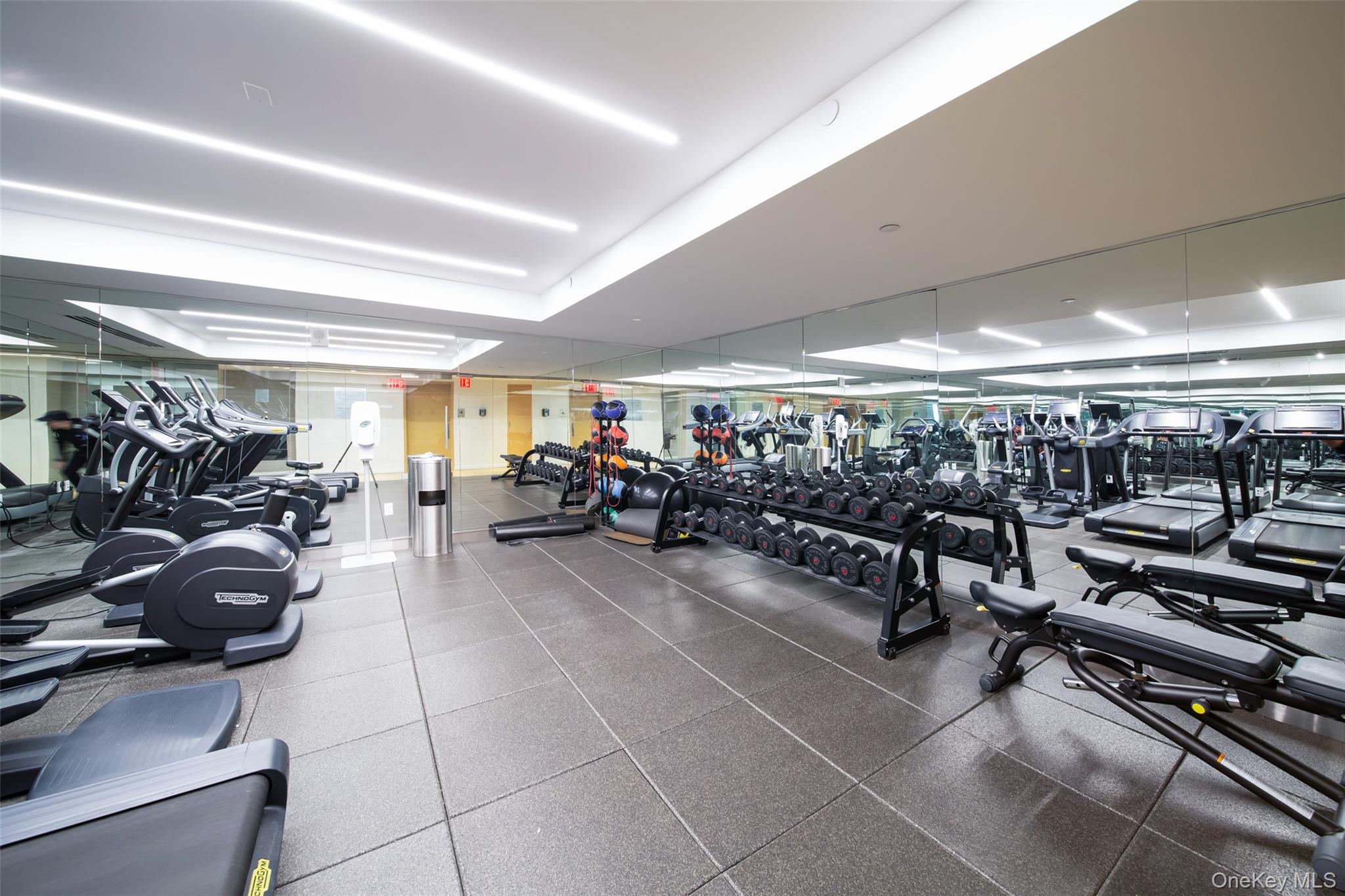 138-35 39th Avenue, Unit 17H Queens, NY 11354 - Photo 5 of 36 a view of a room with gym equipment