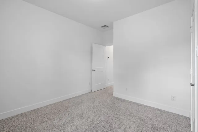 a view of a fountain in the middle of a garden