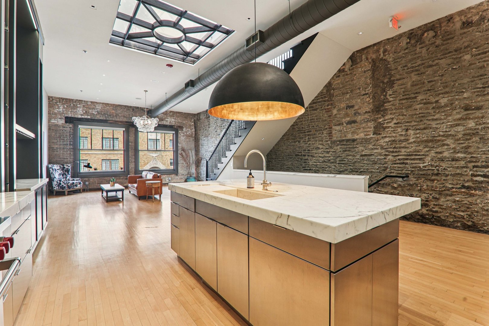 107 West Main Street, Unit 2 St. Charles, IL 60174 - Photo 17 of 32 a spacious bathroom with a sink a mirror and vanity
