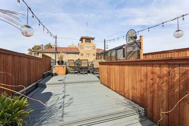 a view of a building and a street