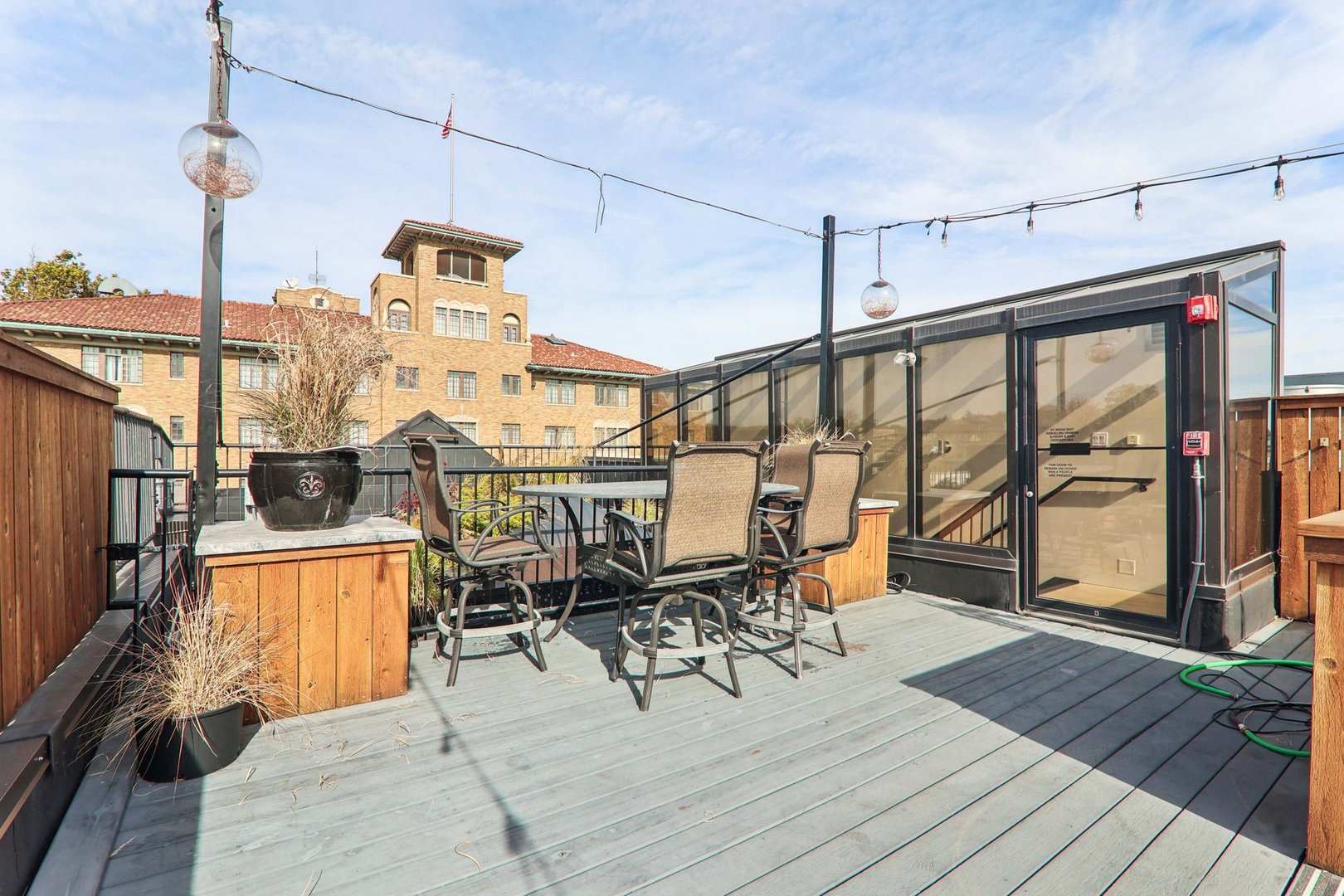 107 West Main Street, Unit 2 St. Charles, IL 60174 - Photo 28 of 32 a view of a balcony dining area with furniture