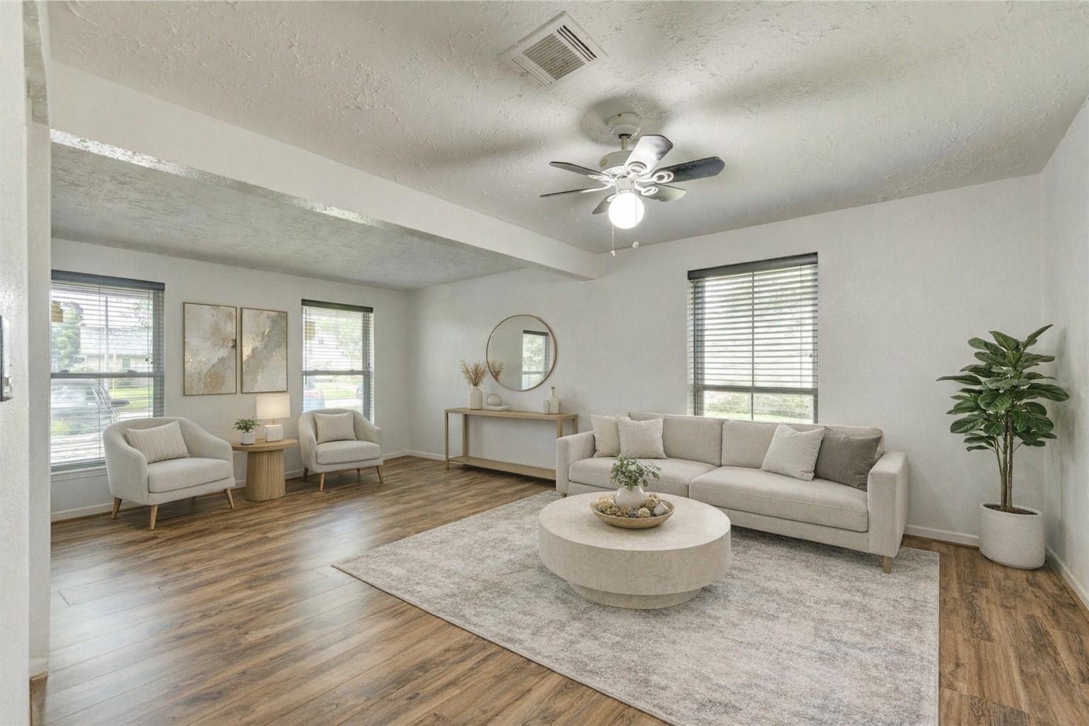 21014 Cimarron Parkway Katy, TX 77450 - Photo 4 of 21 a living room with furniture and a large window