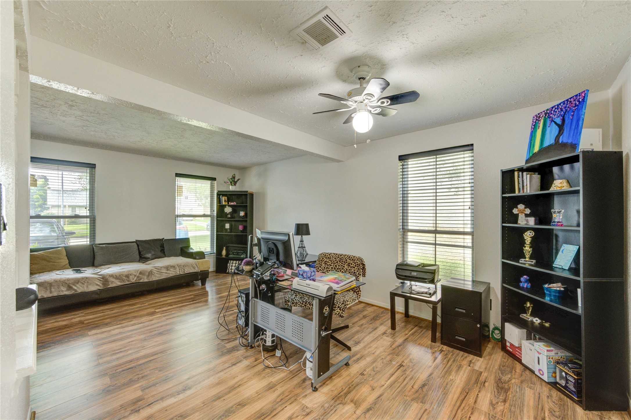 21014 Cimarron Parkway Katy, TX 77450 - Photo 5 of 21 a living room with furniture a rug and a window