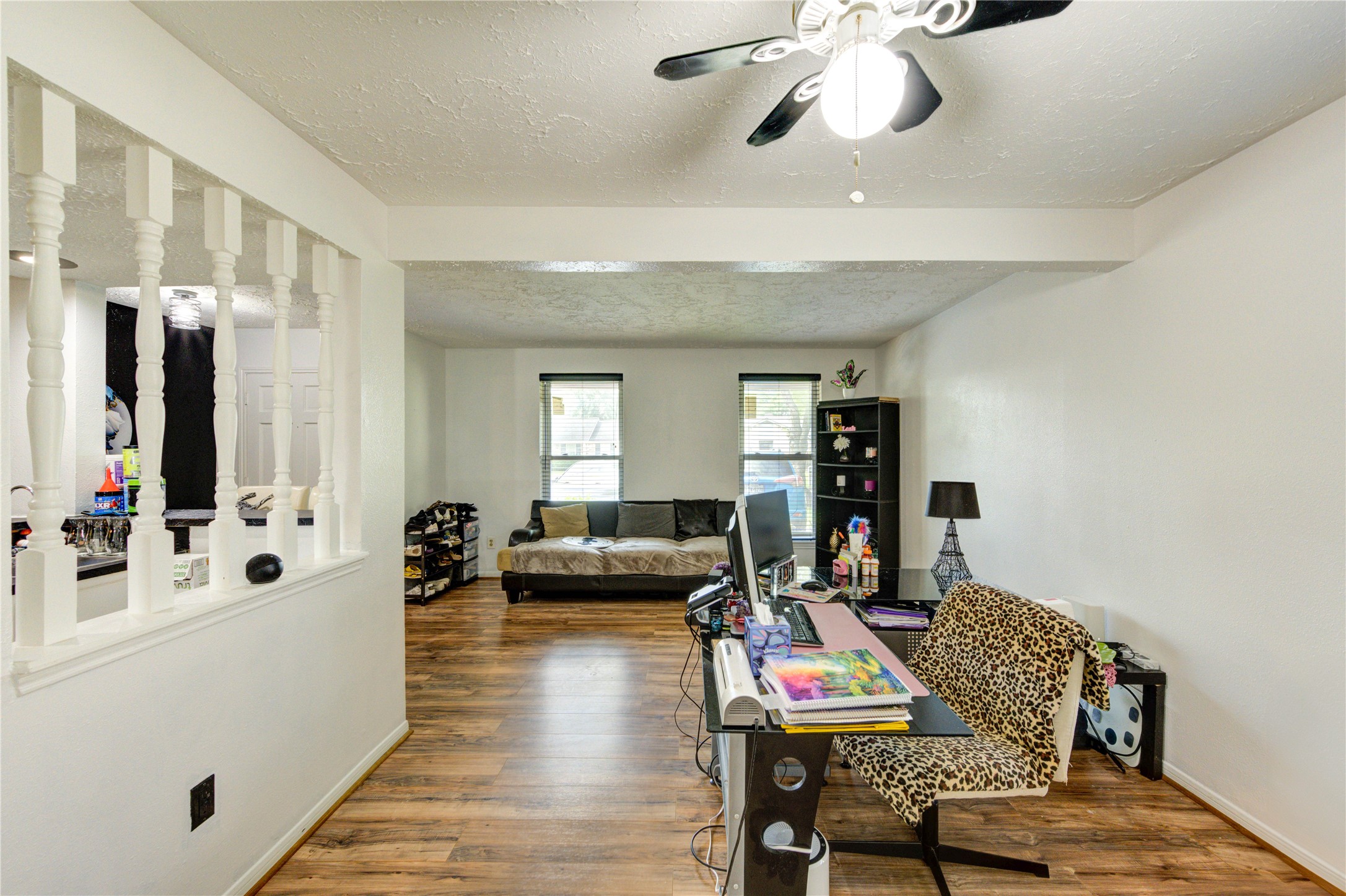 21014 Cimarron Parkway Katy, TX 77450 - Photo 6 of 21 a living room with furniture and wooden floor