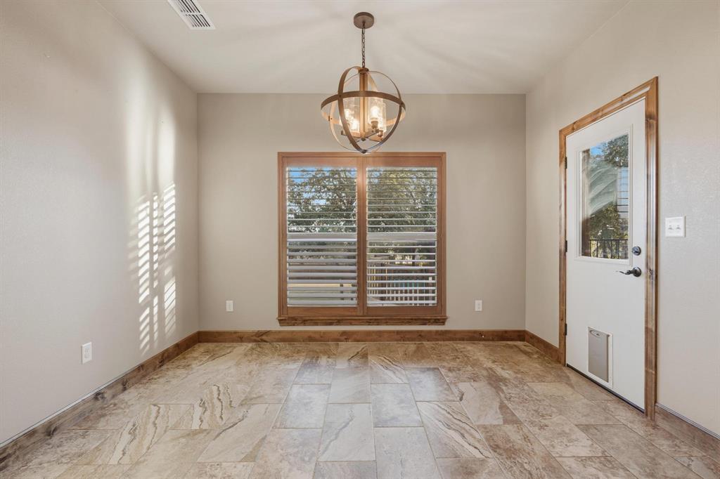 109 Benton Tuscola, TX 79562 - Photo 11 of 40 a view of an empty room with a window