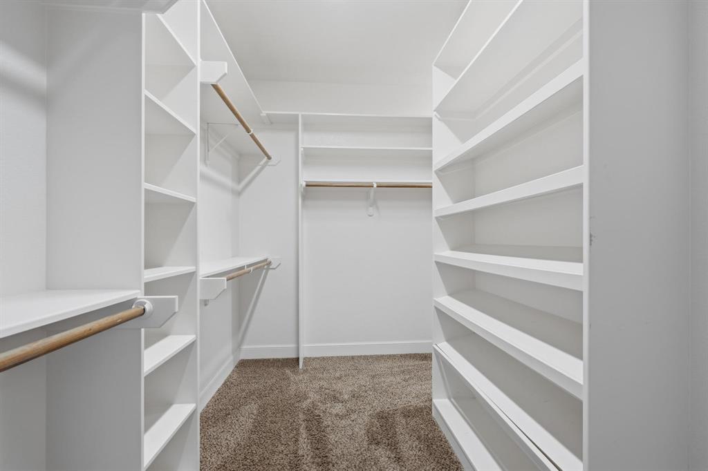 109 Benton Tuscola, TX 79562 - Photo 16 of 40 a view of walk in closet with empty racks
