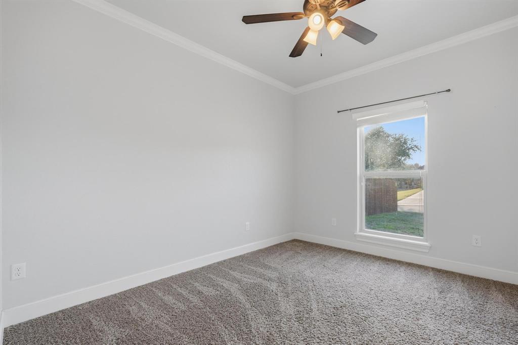 109 Benton Tuscola, TX 79562 - Photo 20 of 40 a view of an empty room with a window