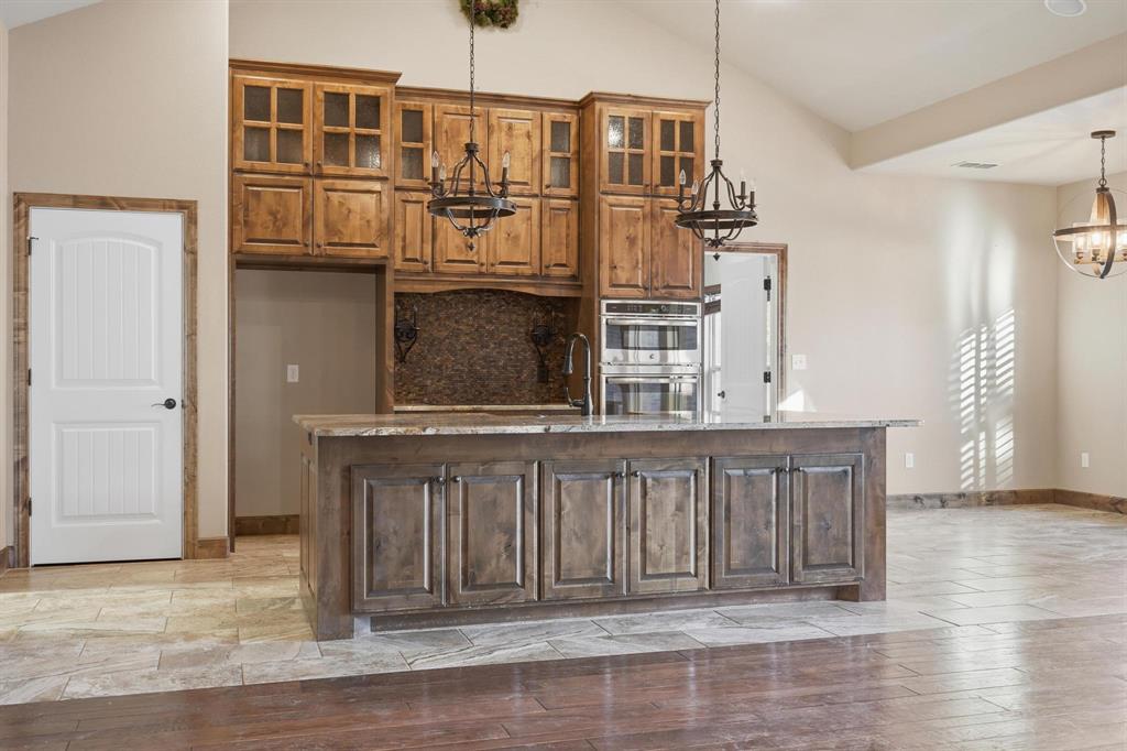 109 Benton Tuscola, TX 79562 - Photo 10 of 40 a view of a house with entryway and wooden floor