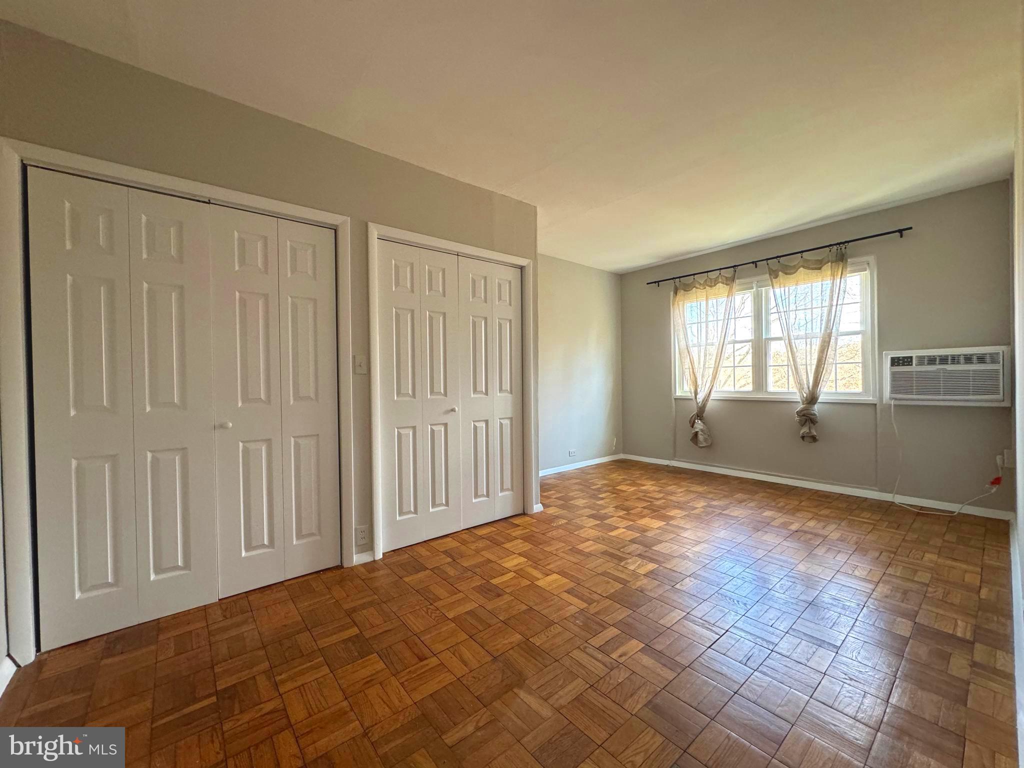 1726 Preston Road Alexandria, VA 22302 - Photo 12 of 27 a view of an empty room and window and wooden floor