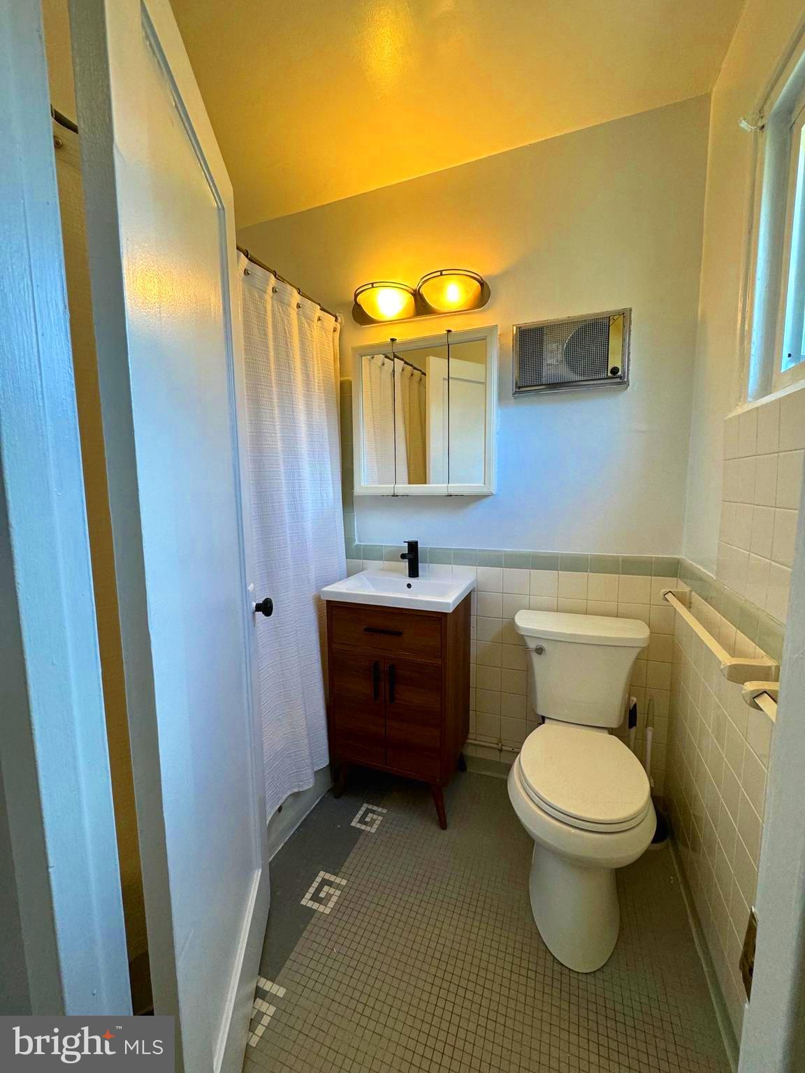 1726 Preston Road Alexandria, VA 22302 - Photo 10 of 16 a bathroom with a toilet and a sink