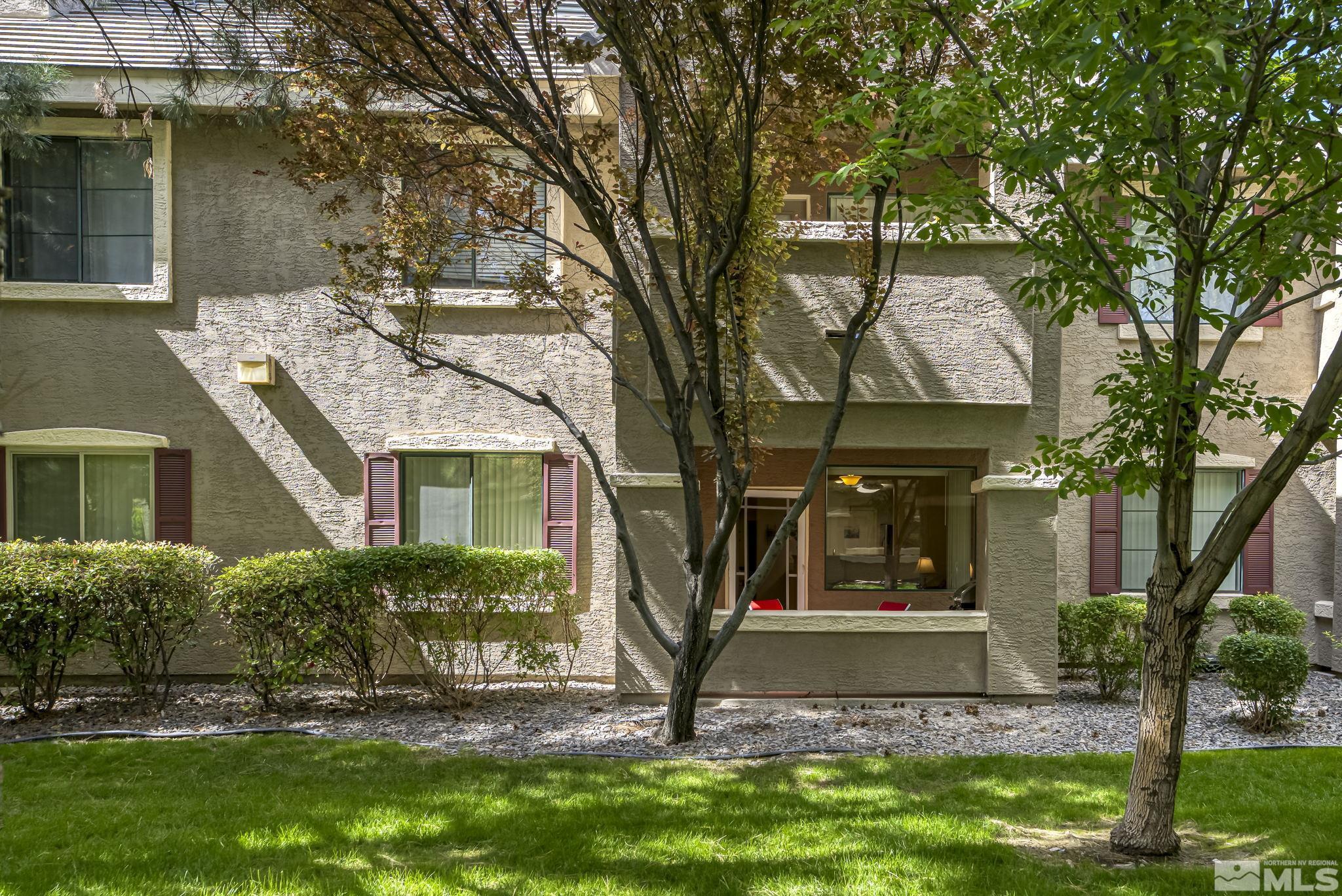 900 South Meadows Parkway, Unit 312 Reno, NV 89521 - Photo 28 of 38 front view of house with a yard