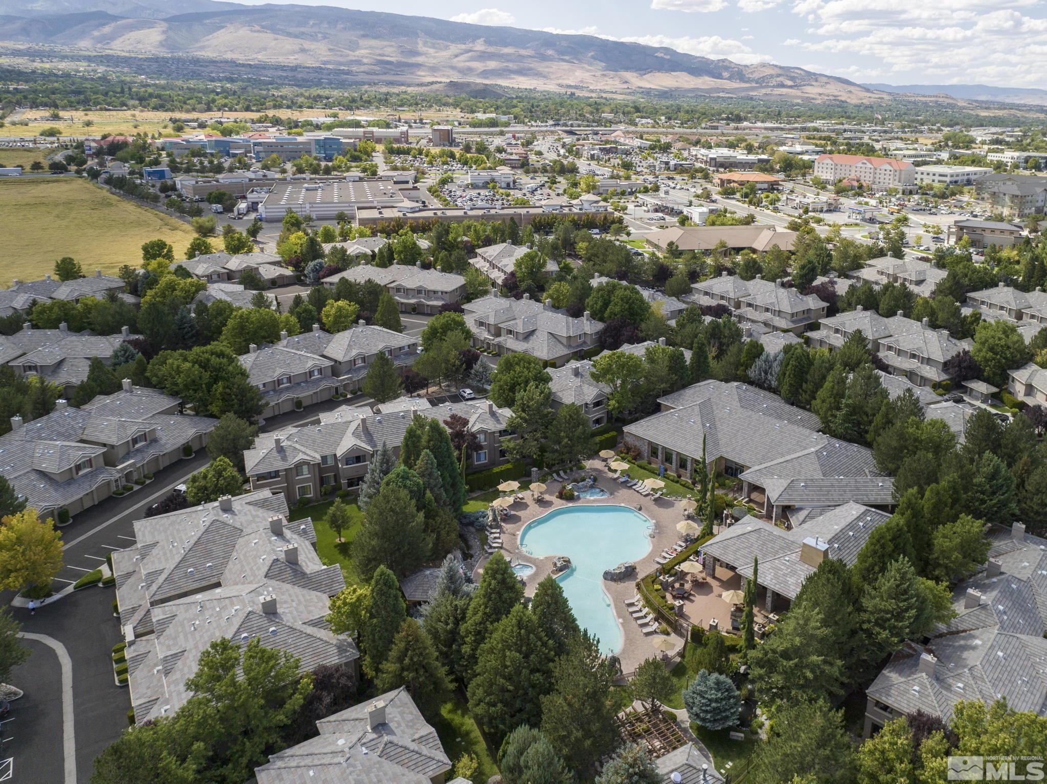 900 South Meadows Parkway, Unit 312 Reno, NV 89521 - Photo 32 of 38 an aerial view of ocean and residential houses with outdoor space