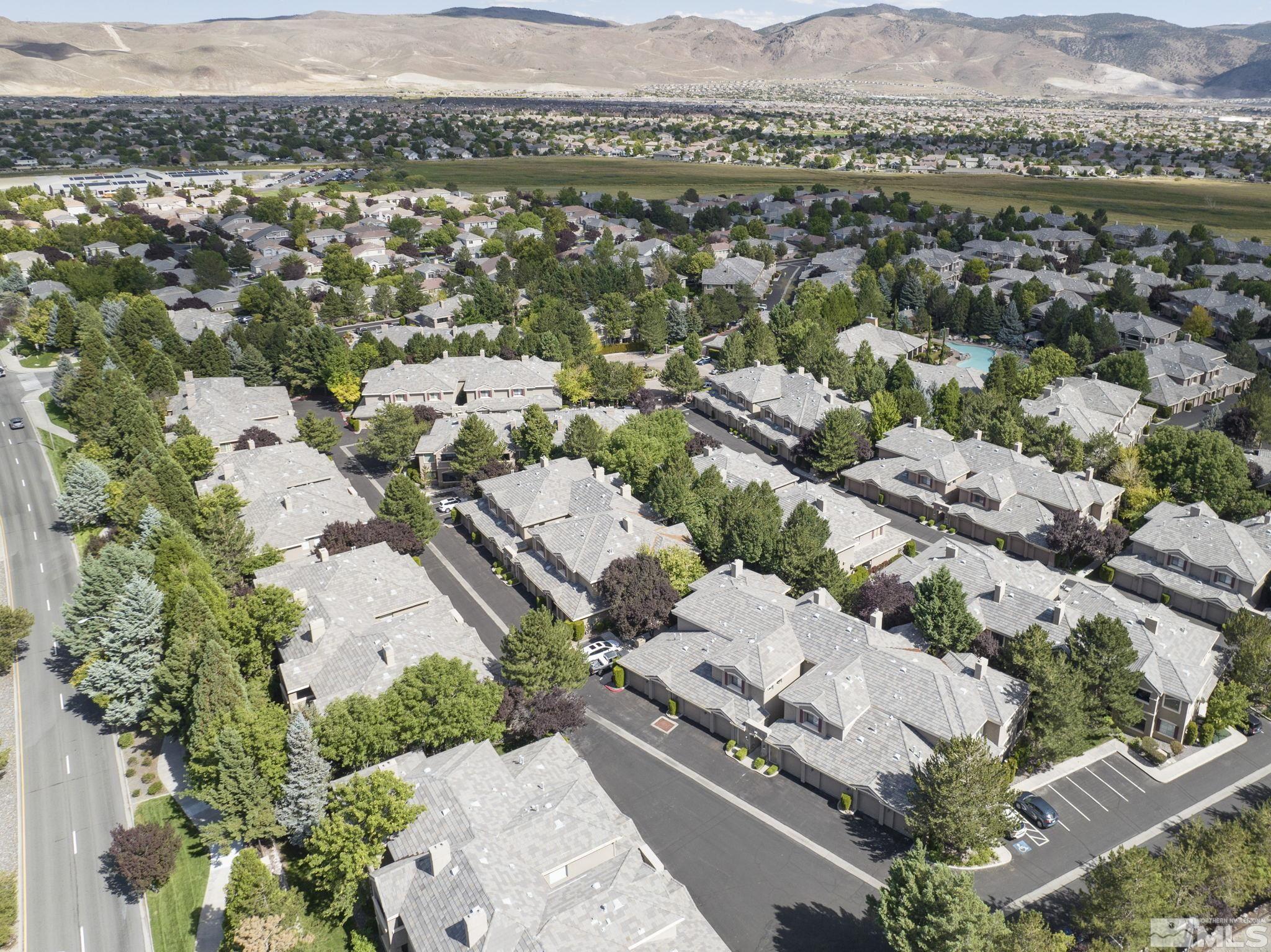 900 South Meadows Parkway, Unit 312 Reno, NV 89521 - Photo 34 of 38 an aerial view of a city with lots of residential buildings