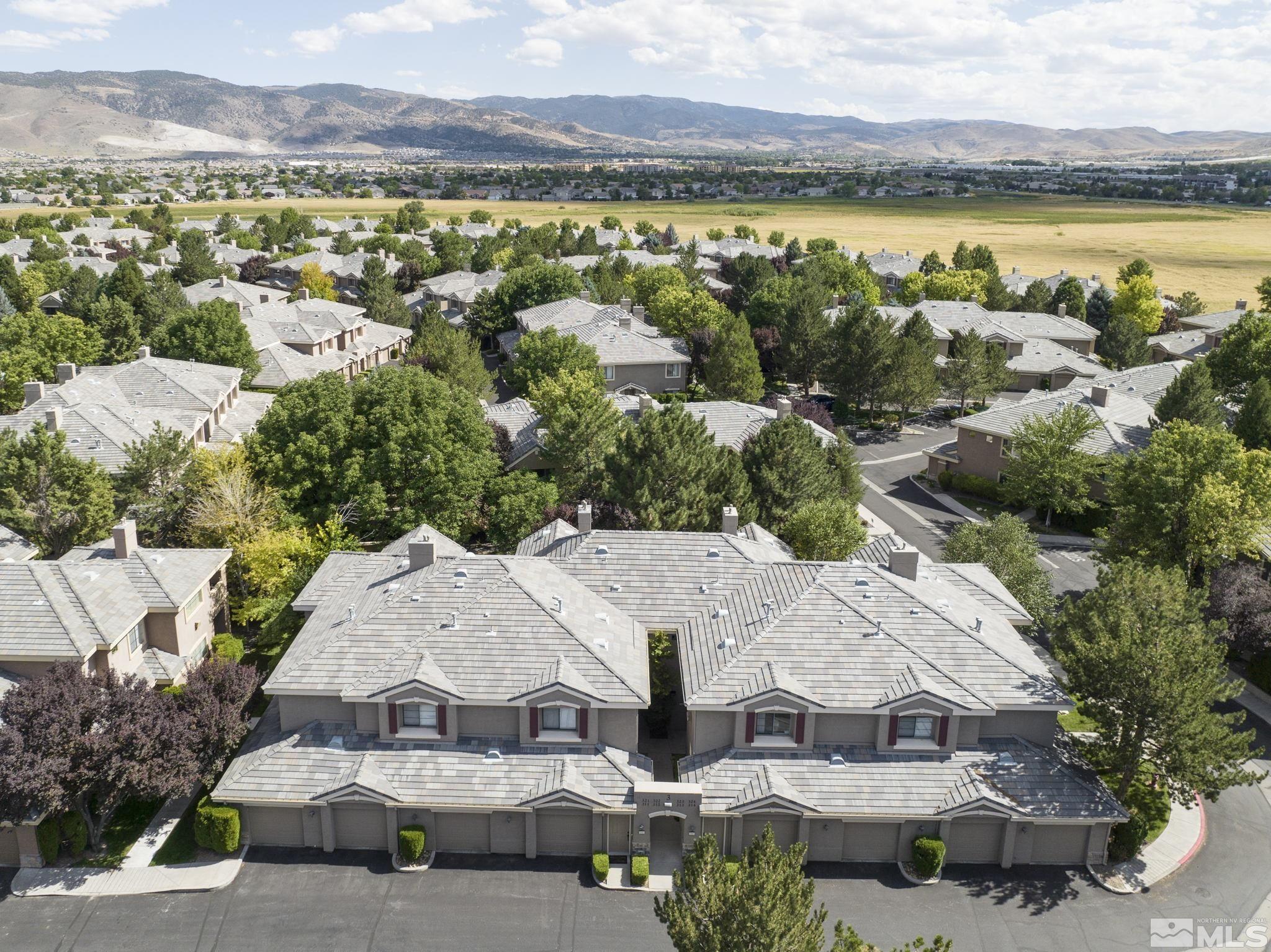 900 South Meadows Parkway, Unit 312 Reno, NV 89521 - Photo 35 of 38 an aerial view of a house with a lake view