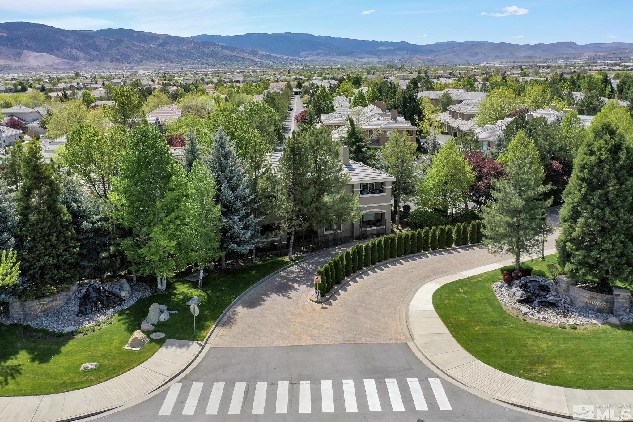 900 South Meadows Parkway, Unit 312 Reno, NV 89521 - Photo 38 of 38 a view of a garden with a swimming pool