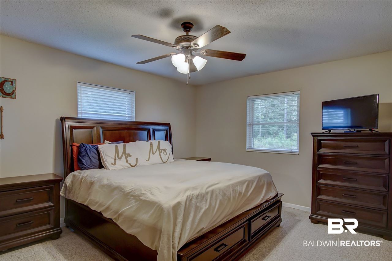 22601 Price Grubbs Road Robertsdale, AL 36567 - Photo 31 of 39 Master Bedroom