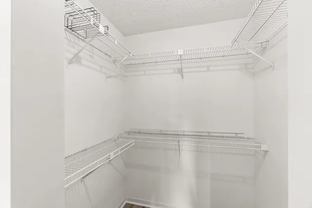 a view of a room with racks on the wall