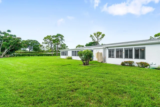 a view of a house with a big yard