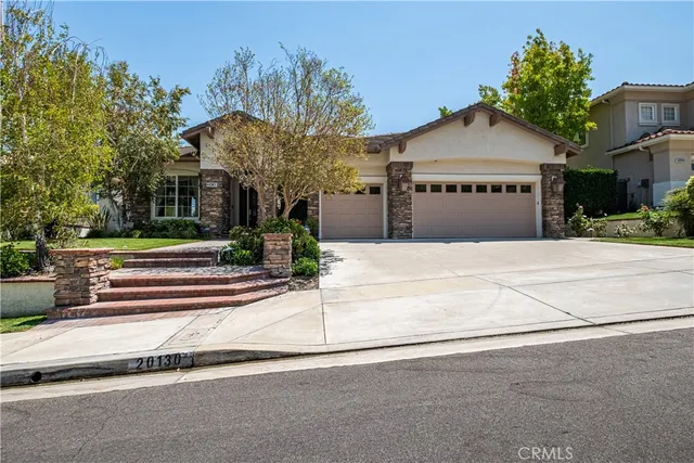 front view of a house with a street