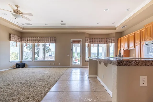 a view of a kitchen with granite countertop lots of counter top space
