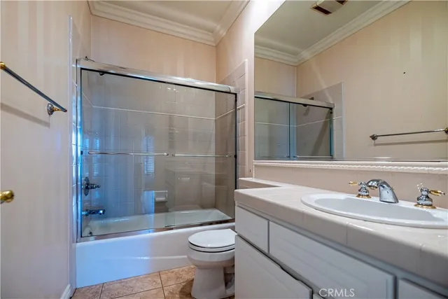 a view of room with a ceiling fan and window