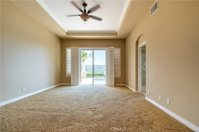 a spacious bathroom with a granite countertop tub sink and mirror