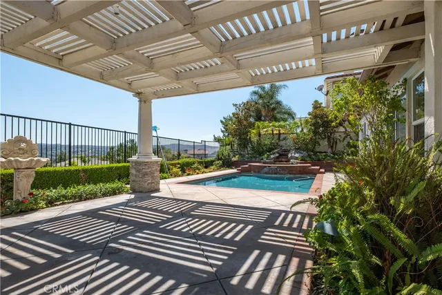 a view of balcony with wooden floor