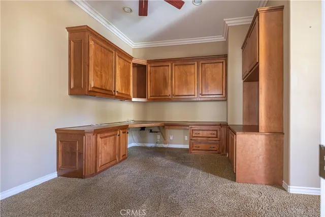 a kitchen with stainless steel appliances granite countertop a stove and a refrigerator