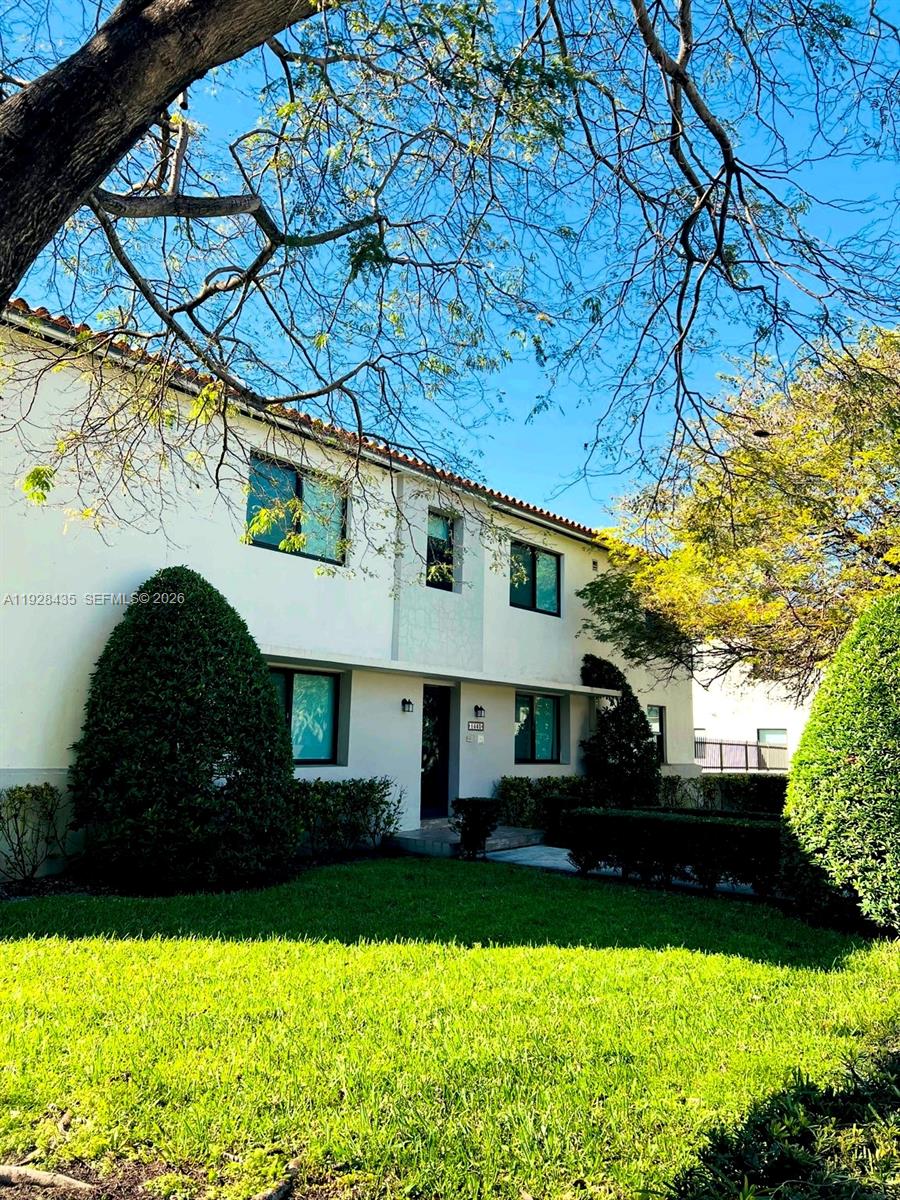 4204 Southwest 14th Street, Unit 3 Miami, FL 33134 - Photo 3 of 15 a front view of a house with a yard