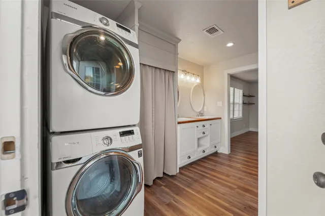 a view of a house with a yard and sitting area