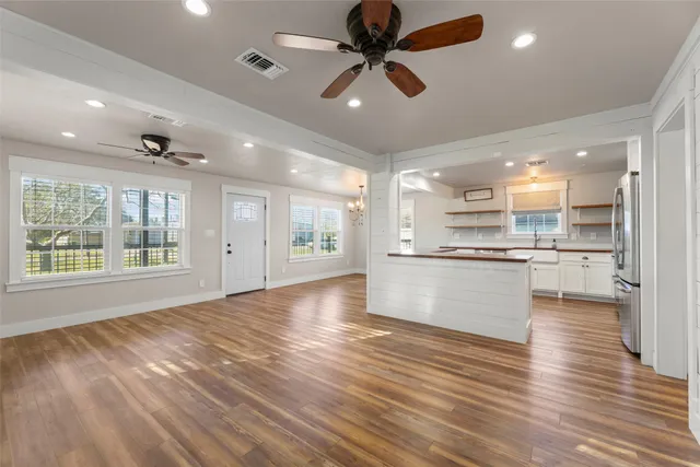 a bathroom with a sink a mirror and a shower