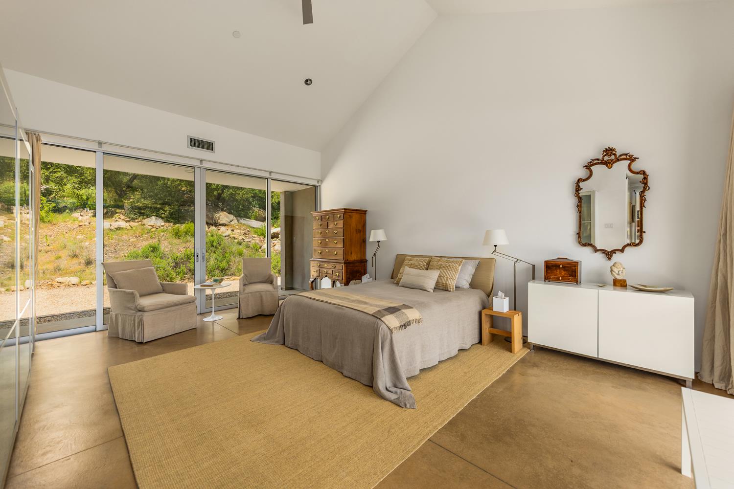 12179 Koenigstein Road Santa Paula, CA 93060 - Photo 29 of 43 a room with a bed and large windows