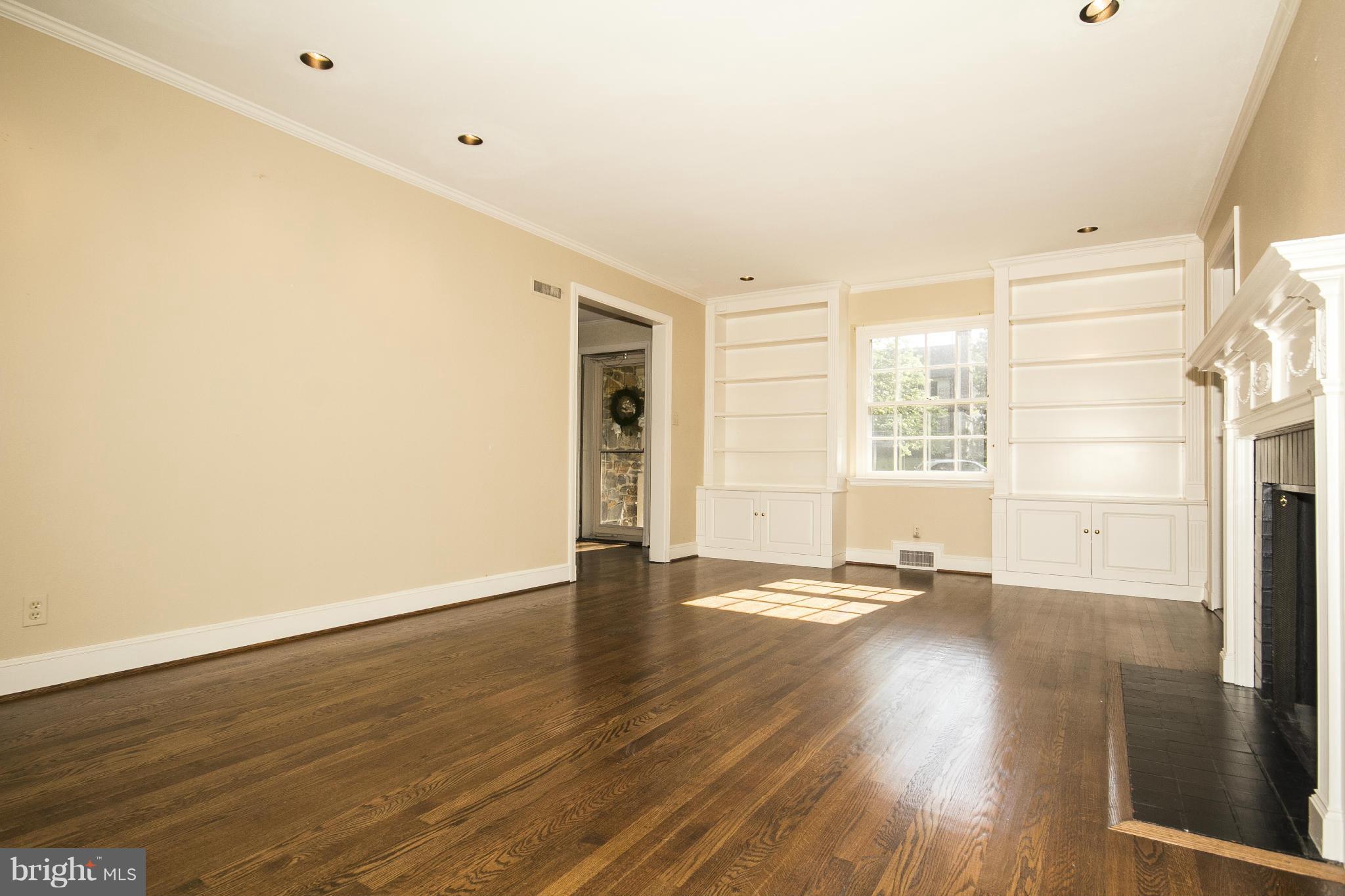 5504 Kemper Road Baltimore, MD 21210 - Photo 12 of 29 Living Room with Built in Bookcases