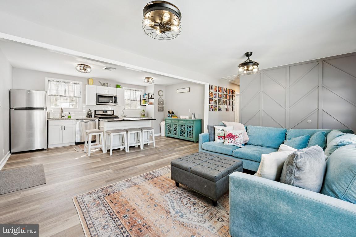 8 Lancia Place Lindenwold, NJ 08021 - Photo 8 of 24 a living room with furniture and kitchen view