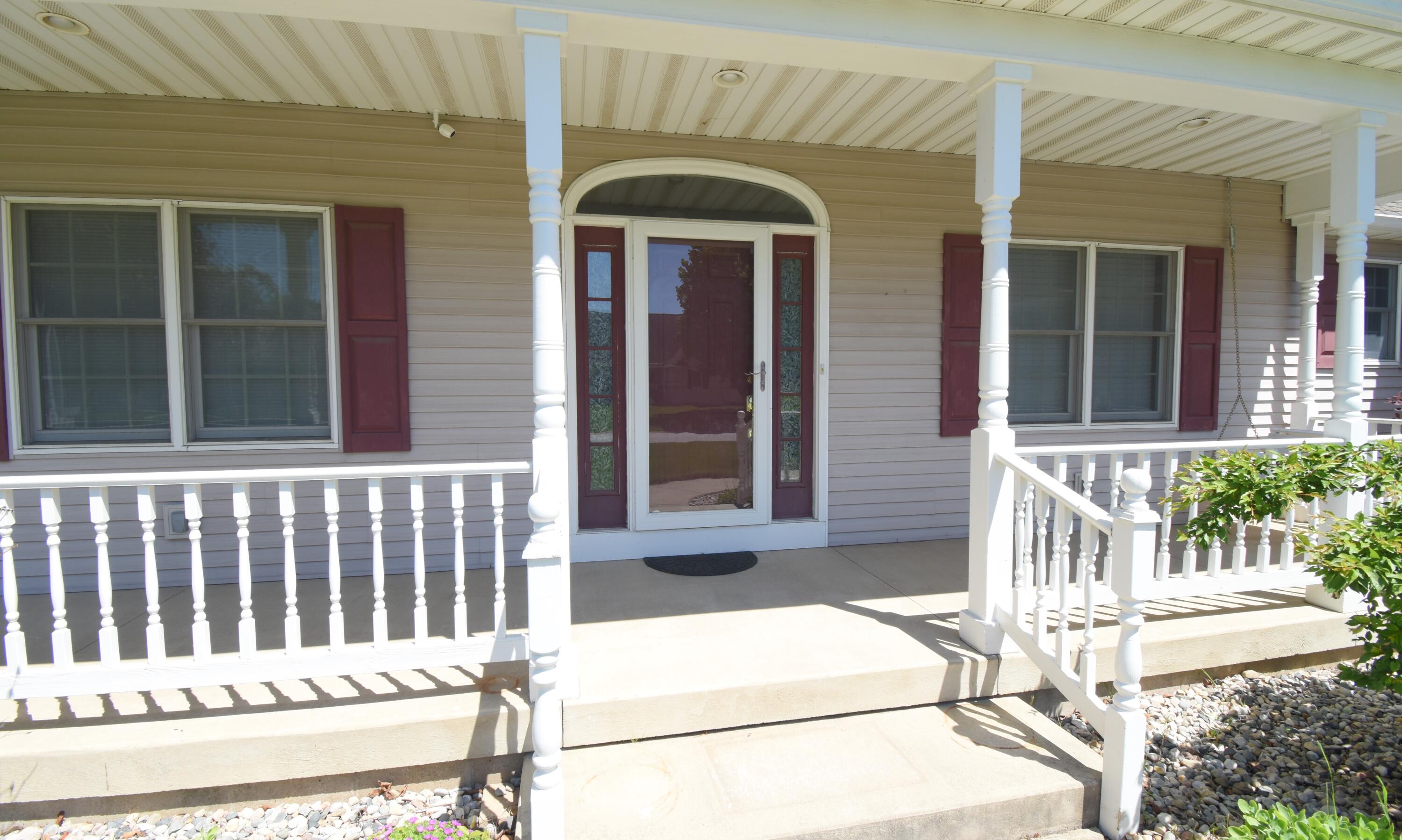 522 Pheasant Run Rensselaer, IN 47978 - Photo 7 of 55 front view of a house with a porch