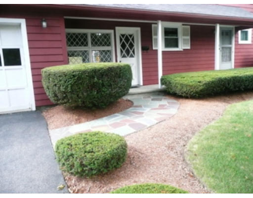7 Surrey Road Salem, MA 01970 - Photo 11 of 15 a view of a backyard with garden