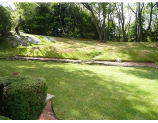 7 Surrey Road Salem, MA 01970 - Photo 12 of 15 a view of a yard with a house and trees