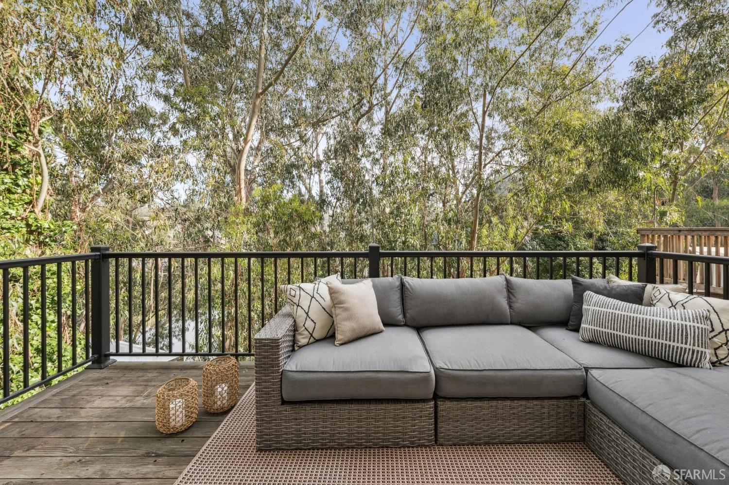 4459 View Place Oakland, CA 94611 - Photo 11 of 40 a roof deck with couches and wooden floor