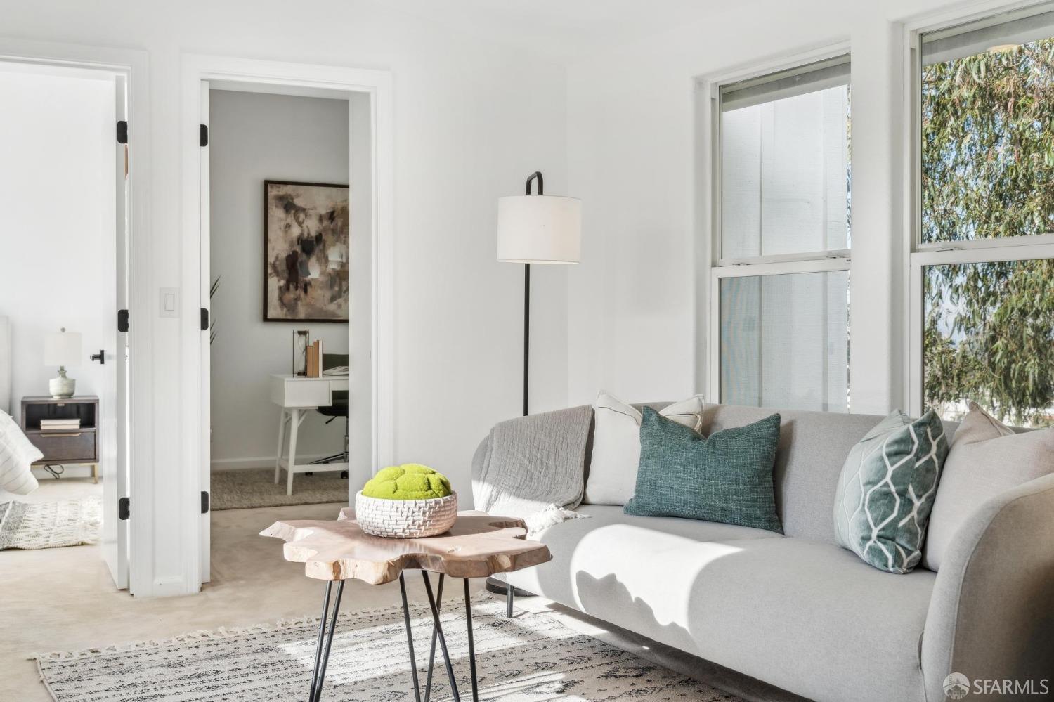 4459 View Place Oakland, CA 94611 - Photo 30 of 40 a living room with furniture and a table