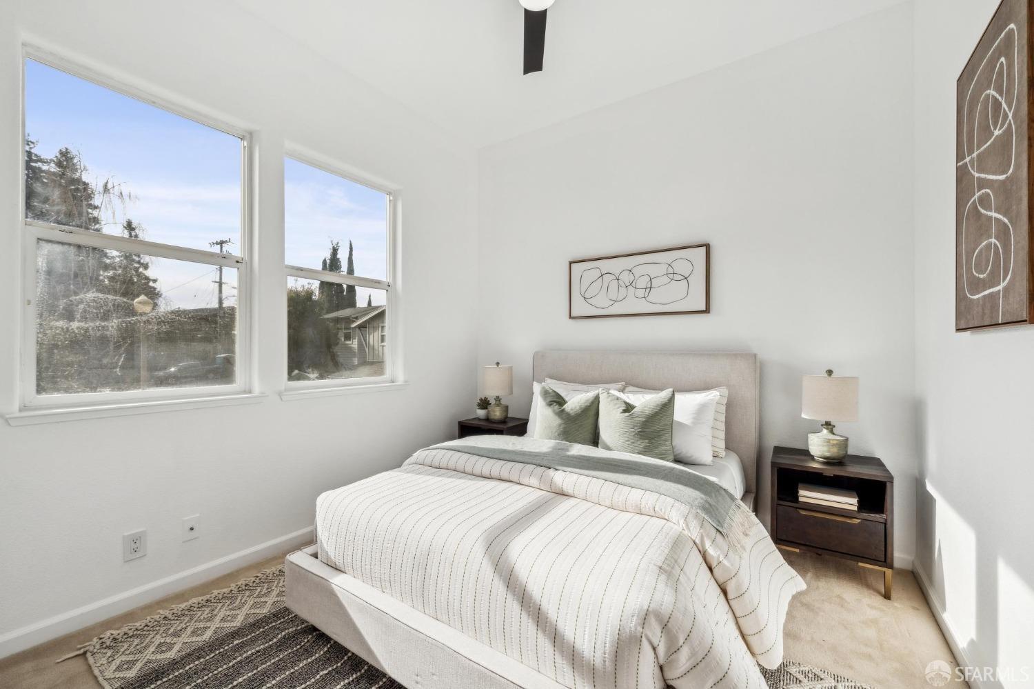 4459 View Place Oakland, CA 94611 - Photo 33 of 40 a bedroom with a bed and a window