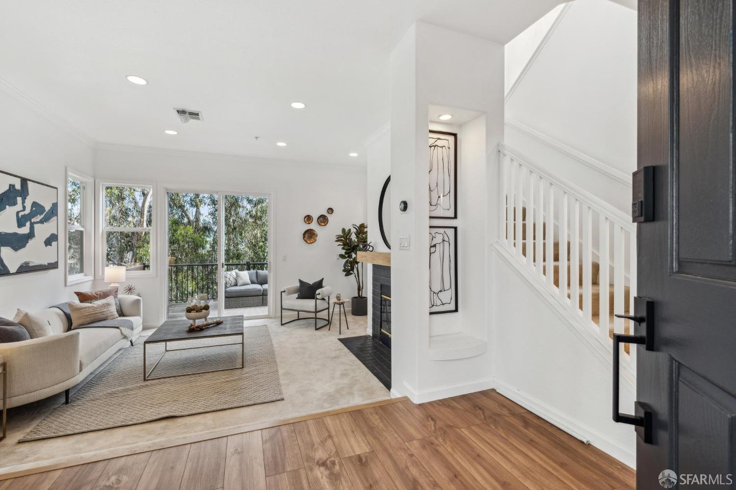 4459 View Place Oakland, CA 94611 - Photo 6 of 40 a living room with furniture and wooden floor