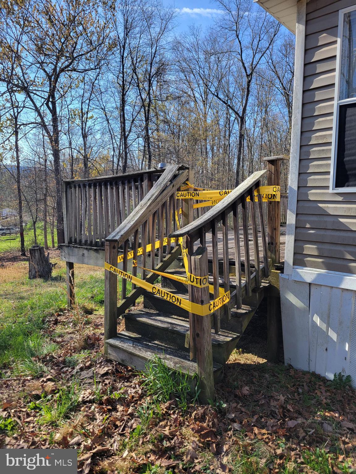 1957 Milk Road High View, WV 26808 - Photo 3 of 10 a view of backyard with wooden deck and a backyard