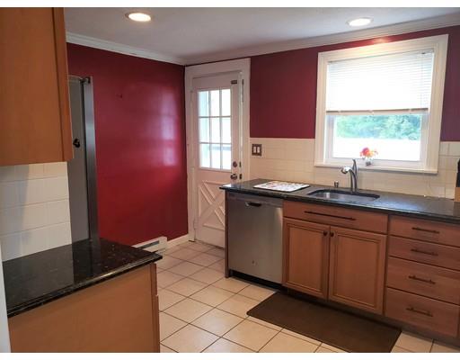 20 Mellen Street Hopedale, MA 01747 - Photo 12 of 22 a kitchen with granite countertop a sink and a stove
