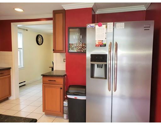 20 Mellen Street Hopedale, MA 01747 - Photo 15 of 22 a kitchen with stainless steel appliances granite countertop a refrigerator and a sink