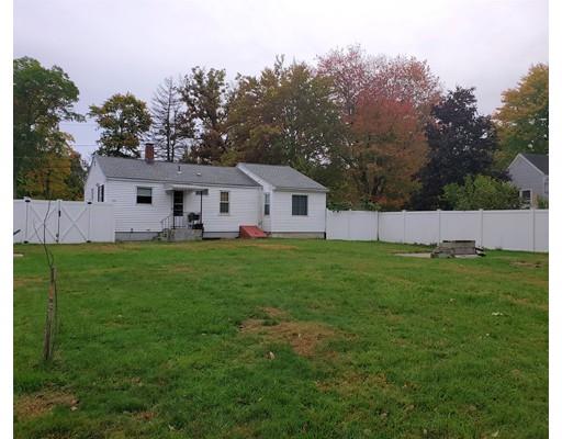 20 Mellen Street Hopedale, MA 01747 - Photo 17 of 22 a front view of house with yard and green space